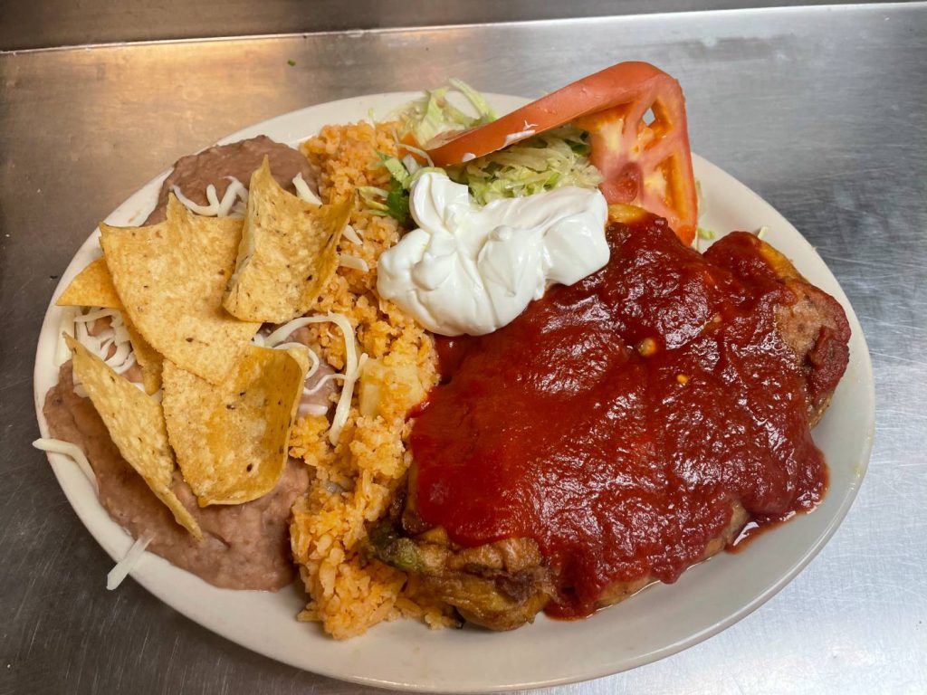 Chile relleno dinner with rice and beans